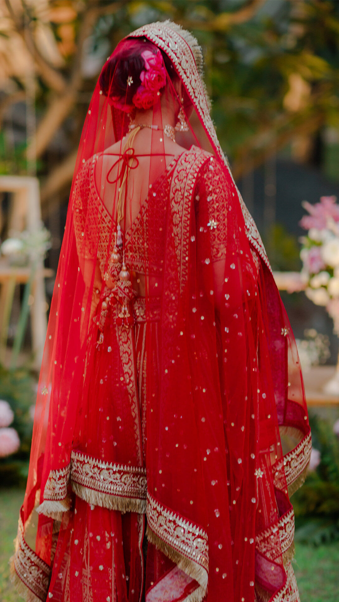 Gujrati Bride wearing red lehenga for wedding